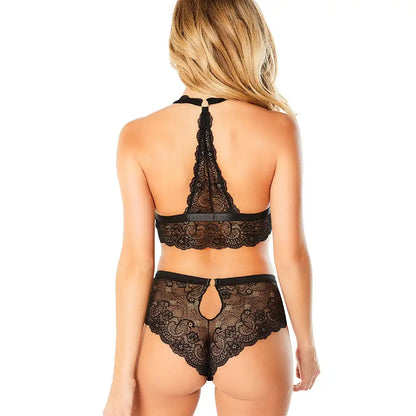 woman wearing black scallop lace halter bralette and matching lace boyshort set