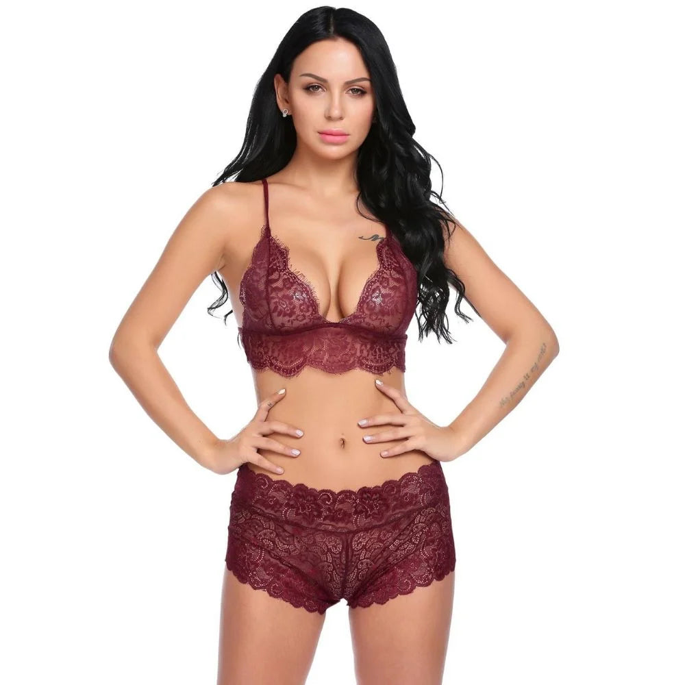 Women floral lace lingerie set with sheer bralette and matching lace shorts.