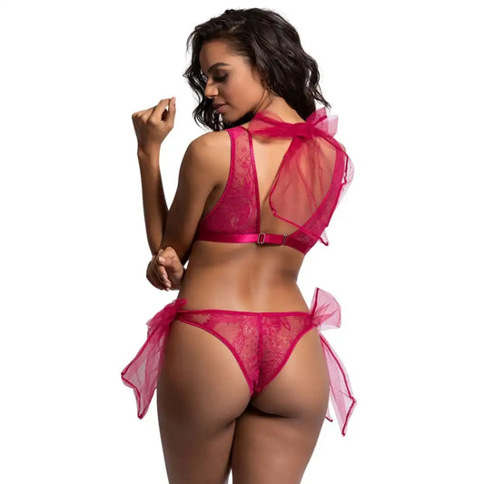 woman wearing raspberry pink sheer lace bralette and matching thong lingerie set