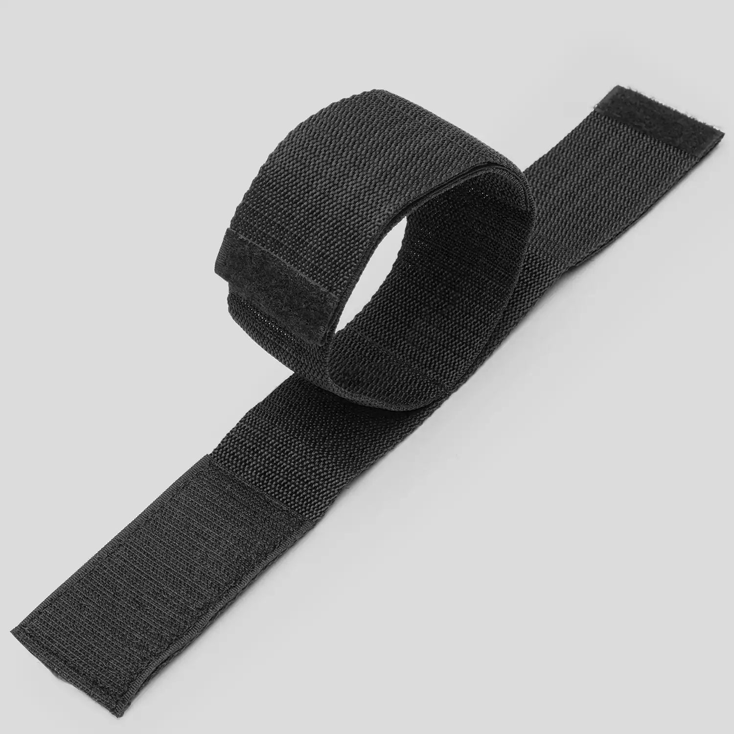 Black wrist-to-ankle restraint set with adjustable wrist cuffs and ankle straps connected through durable nylon webbing.